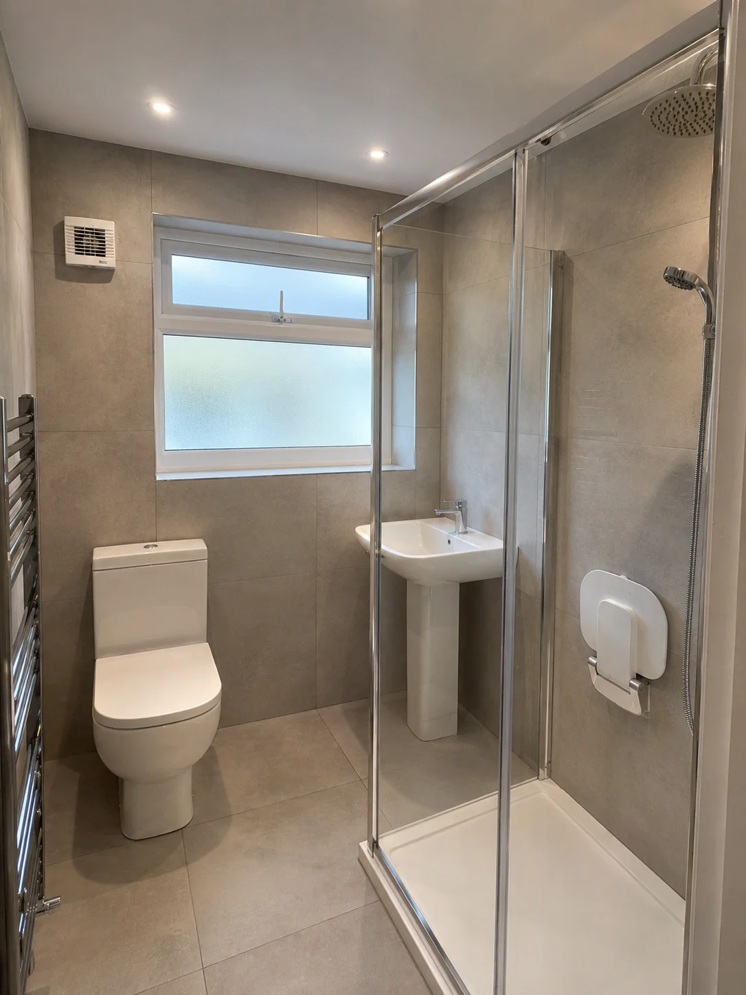 A bath-to-shower conversion with enclosed shower.